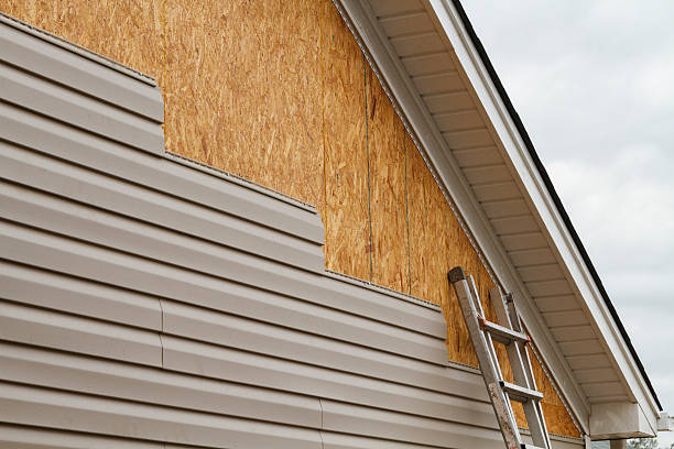 Professional Siding Contractor technician working in Centerport, NY